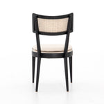 Featuring Britt Brushed Ebony Dining Chair by Four Hands at Amethyst Home. Mixed materials refresh retro dining style. Ebony-finished nettlewood frames a textural inlay of natural cane, for perfect contrast. Fastened by Velcro, high-performance linen-blend seating for modern sensibility. Performance fabrics are specially created to withstand spills, stains, high traffic and wear, ensu. Amethyst Home provides interior design, new construction, custom furniture and area rugs in the Dallas metro area