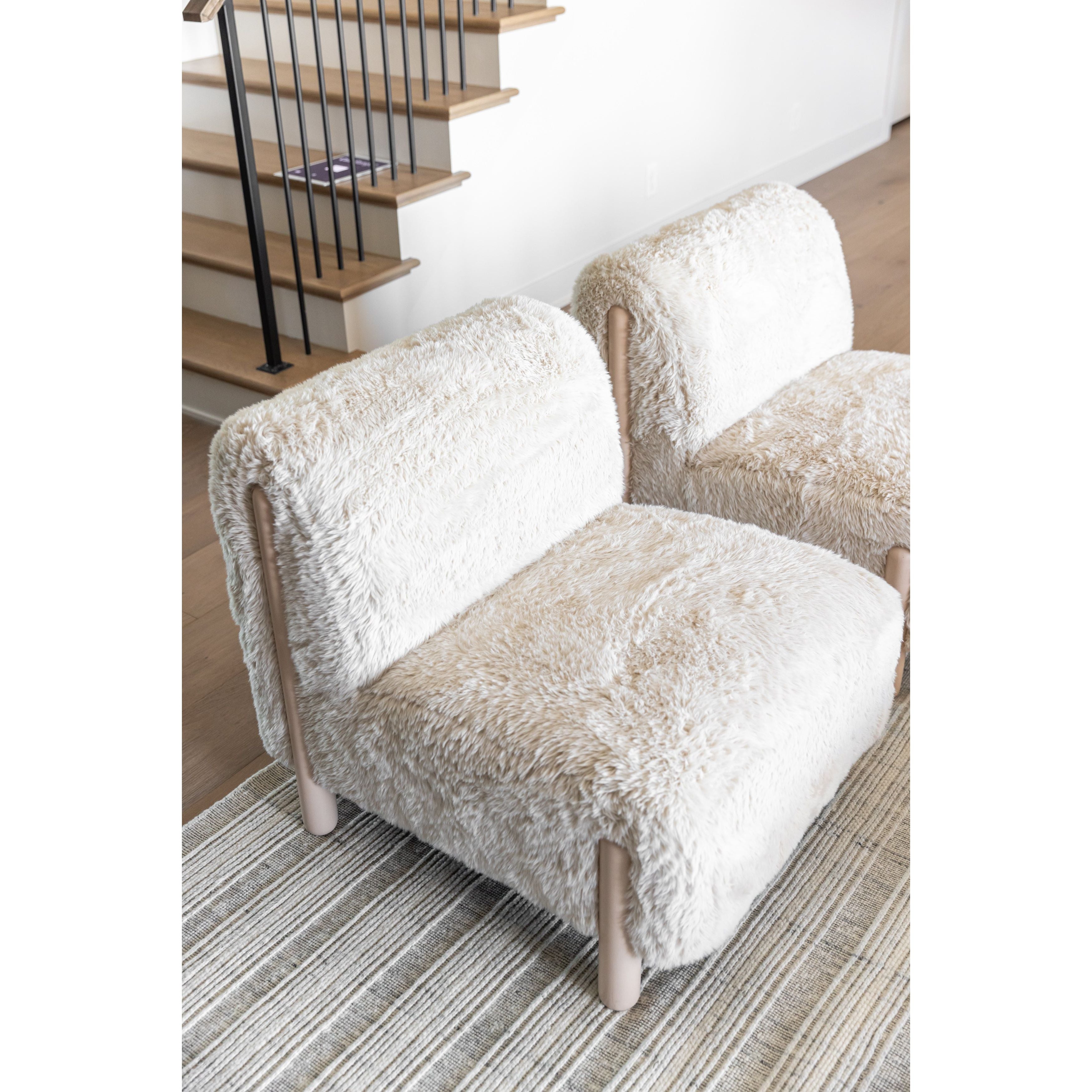 Featuring Chloe Accent Chair by Surya at Amethyst Home. An Amethyst fave -- the Chloe chair is a cozy must have.  Delightfully soft, the Chloe accent chair is a beautiful casual addition to a modern space.
Dimensions and Details: 34" W x 38" L x 30" HCover: 100% PolyesterCushion Fill: Polyurethane Foam, Polyester/PolyfillSeat Depth: 22"KNW-001.  Amethyst Home provides interior design, new home construction design consulting, vintage area rugs, and lighting in the Miami metro area.