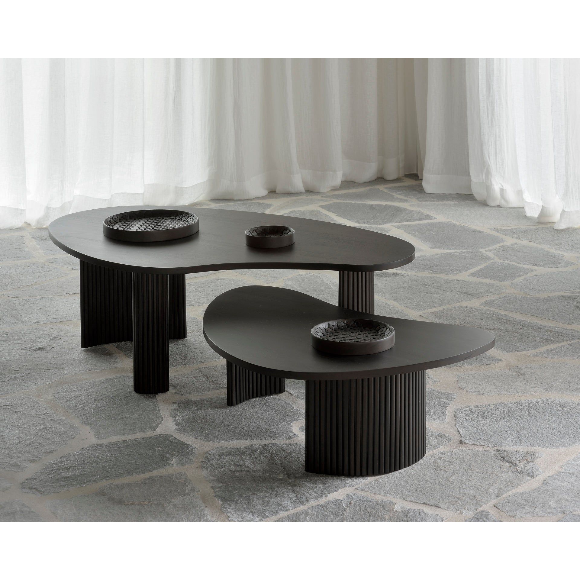 Featuring Mahogany Boomerang Coffee Table - Large by Ethnicraft at Amethyst Home. Playful, pebble shapes set on a beautiful, folded, base. The Boomerang coffee table is a fantastic and well-proportioned addition to any space. Configured with the two sizes together, or as a stand-alone, this design is sure to capture attention.
Dimensions: 30"d x 49.5"w .  Amethyst Home provides interior design, new home construction design consulting, vintage area rugs, and lighting in the Laguna Beach metro area.