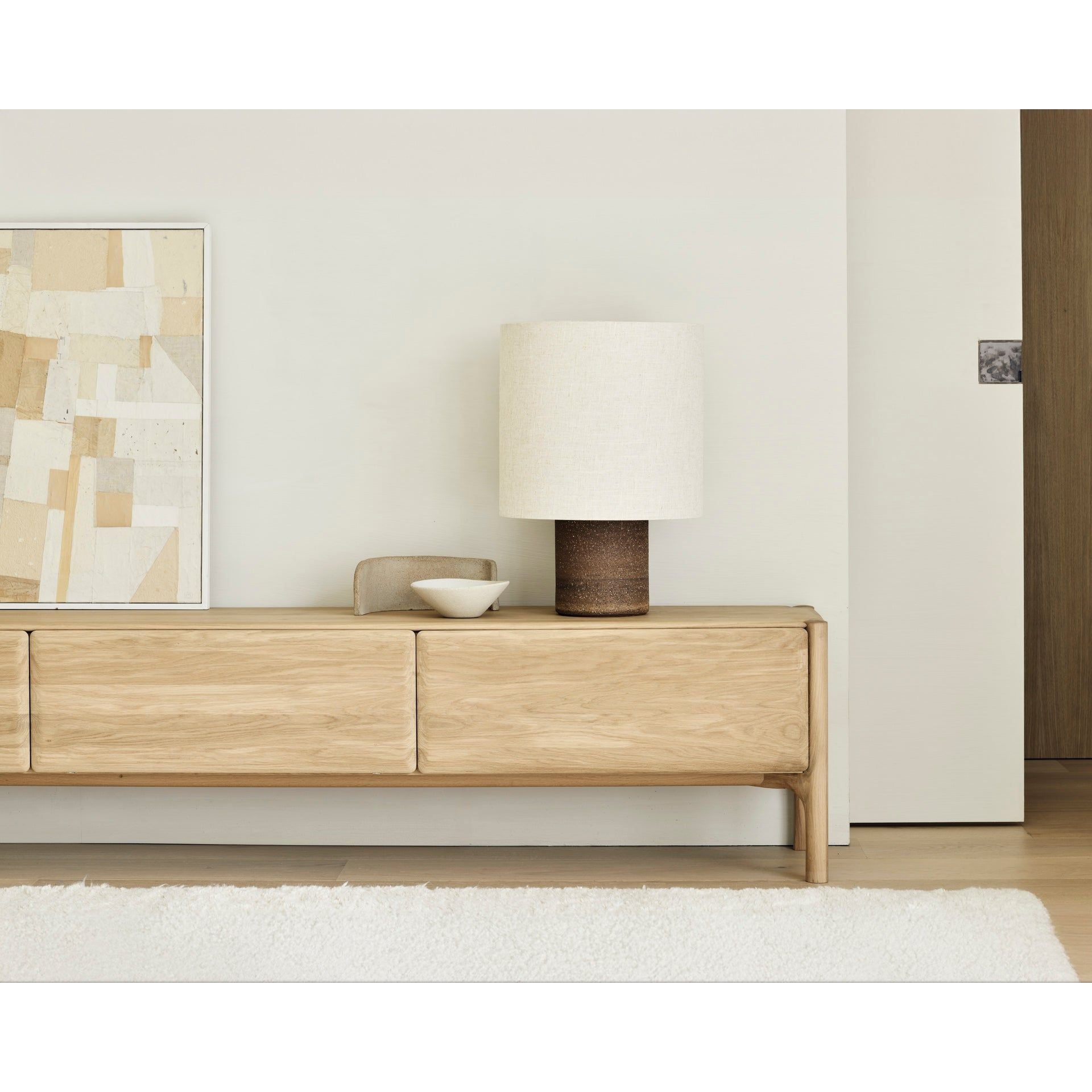 Featuring Pi Oak Tv Cupboard by Ethnicraft at Amethyst Home. The PI collection honours nature’s design by keeping the strength, curves and lines, as nature intended. Interesting shapes are discovered in this sleek and stylish, polished imperfect, finish. Each PI item is finished by hand to ensure that the individual character of the wood is respected. The.  Amethyst Home provides interior design, new home construction design consulting, vintage area rugs, and lighting in the Des Moines metro area.