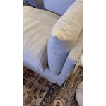 Featuring Habitat Sofa - Valley Nimbus by Four Hands at Amethyst Home. Loungey and slipcovered, the Habitat sofa is made for modern living. Shelter arms and pillow-inspired cushions are covered in comfortable, durable, and stain-resistant performance fabric. The thread within the fabric itself is doused in a material meant to prevent it from becoming stained. Amethyst Home provides interior design, new home construction design consulting, vintage area rugs, and lighting in the Monterey metro area.