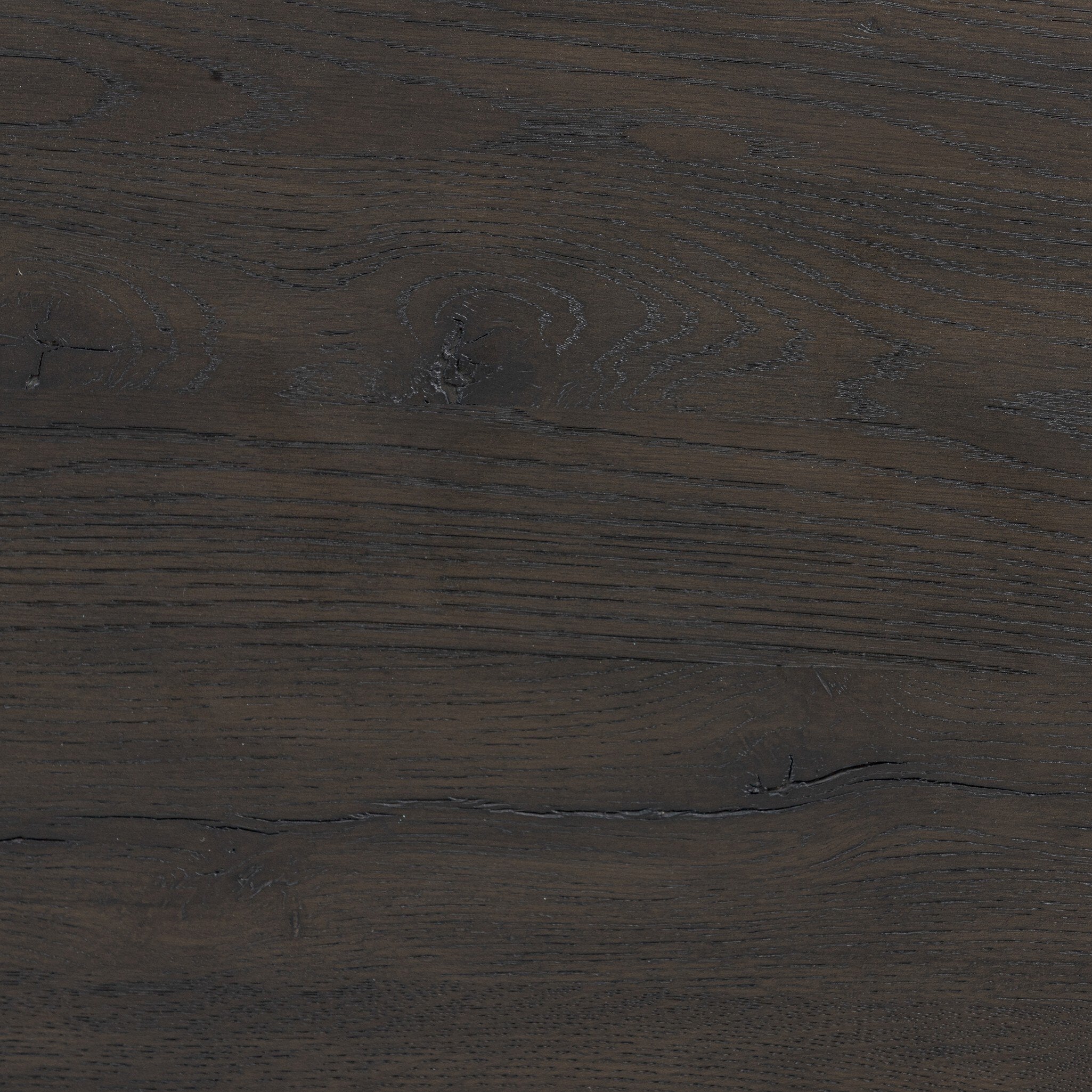 Featuring Alessio Smoked Black Sideboard by Four Hands at Amethyst Home. A smoked black finish plays up natural wood grain, while grid-like patterned doors bring dimension to clean lines. Interior shelving awaits storage of serveware, table linens and more.Overall Dimensions: 82.00"w x 20.00"d x 34.75"hWeight : 203.93 lbsMaterials : Solid Oak, Thick Oak Veneer. Amethyst Home provides interior design, new construction, custom furniture, and area rugs in the Washington metro area