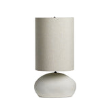 Featuring Allura White Speckled Ceramic Table Lamp by Four Hands at Amethyst Home. A curved ceramic base with a speckled matte finish supports an extra-tall flax linen shade. This elongated silhouette brings a sculptural look to any tabletop.Overall Dimensions: 12.00"w x 11.00"d x 23.00"hWeight : 6.44 lbsMaterials : Ceramic, Thermoplastic, 65% Polyester, 35% Flax/Linen. Amethyst Home provides interior design, new construction, custom furniture, and area rugs in the Tampa metro area