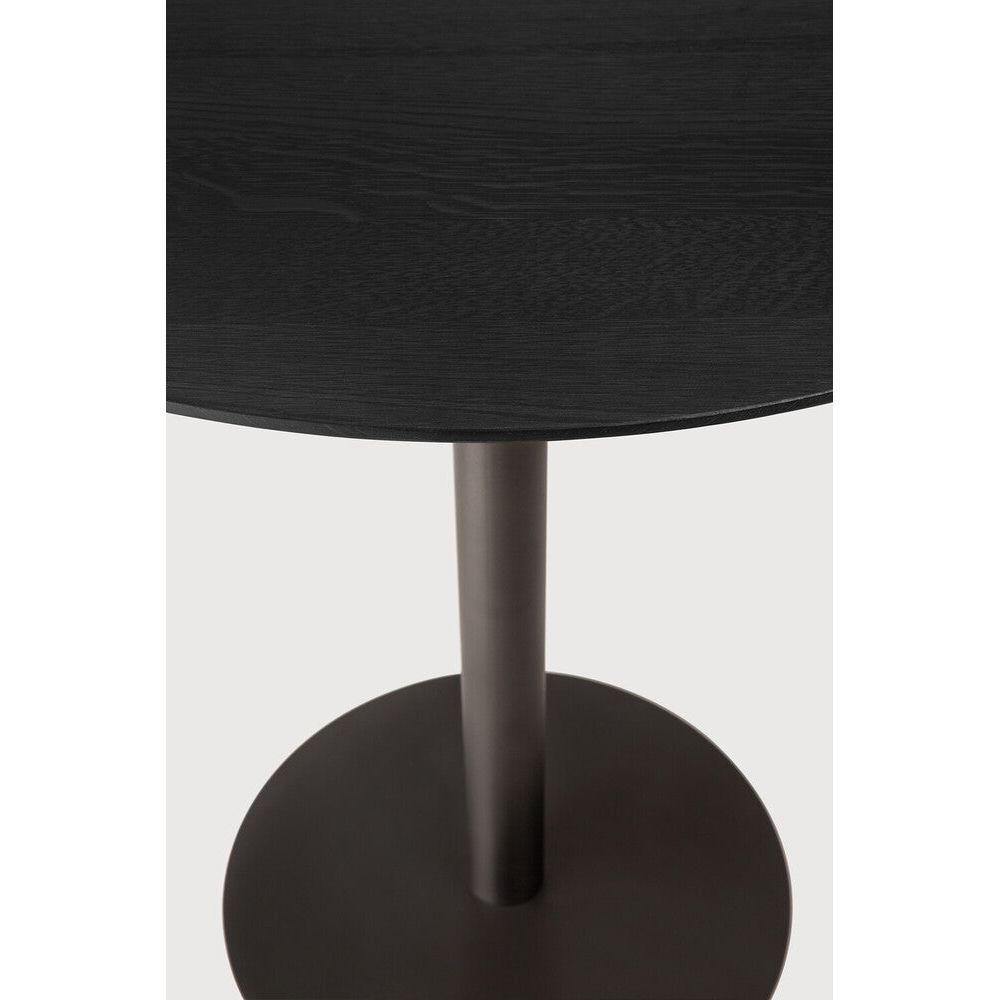 Featuring Blend Dark Bronze Metal Oak Black Dining Table by Ethnicraft at Amethyst Home. The Blend dining table is a dynamic solution that evolves to the needs of modern spaces. Its design features interchangeable table tops, offering flexibility to match any aesthetic, particularly in commercial settings. Compact and versatile, the Blend balances practicality and style for s. Amethyst Home provides interior design, new construction, custom furniture, and area rugs in the Salt Lake City metro area