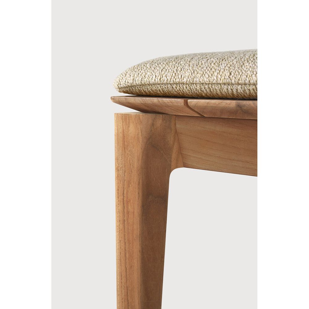 Featuring Bok Natural Teak Outdoor Bench by Ethnicraft at Amethyst Home. Reminiscent of a goat's curved horns, the Bok collection combines sculptural elegance and contemporary crafting into a graceful and airy form. Taking the quality design of the Bok collection outdoors, the Bok outdoor bench pairs perfectly with the Bok dining table, but also as a standalone outdoor seating opt. Amethyst Home provides interior design, new construction, custom furniture, and area rugs in the Park City metro area