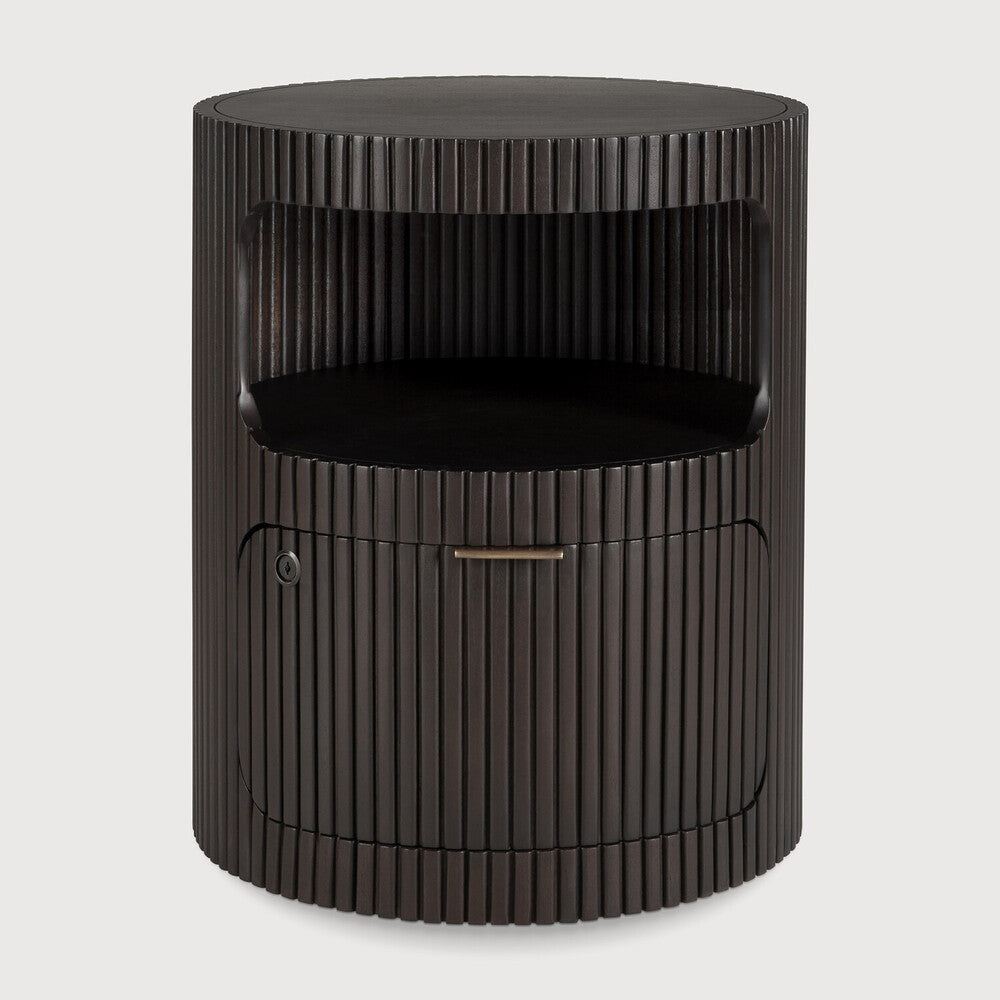 Featuring Boomerang Mahogany Dark Brown Drawer Unit by Ethnicraft at Amethyst Home. Inspired by shapes found in nature, the Boomerang collection features a playful, pebble top set on curved legs with a stacked, wood stick effect. Featuring hand-carved details and the practicality of wheels, the Boomerang drawer unit can serve many purposes, fitting perfectly under a desk for extra. Amethyst Home provides interior design, new construction, custom furniture, and area rugs in the Charlotte metro area