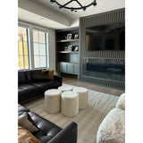 Featuring Folke Pipaluk Pouf by Jaipur Living at Amethyst Home. Cozy and stylish in the same moment, the Folke Pipaluk Pouf collection boasts the soft and inviting texture of the on-trend shearling look. Crafted of wool, the cylinder Micco pouf showcases boucle details and a light and airy design. The solid cream colorway offers a perfectly neutral palette.  Amethyst Home provides interior design, new home construction design consulting, vintage area rugs, and lighting in the San Diego metro area.