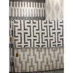 Featuring Keoka Semra Rug by Jaipur Living at Amethyst Home. The Keoka Semra Rug boasts a fresh take on classic Afghani hand-knotted textiles. In rich, grounding tones of gray and ivory, the stylish contrast of the rug anchors room with bold yet neutral appeal. The texture-rich wool pile features a ribbed construction that lends unique linear details to t.  Amethyst Home provides interior design, new home construction design consulting, vintage area rugs, and lighting in the Washington metro area.