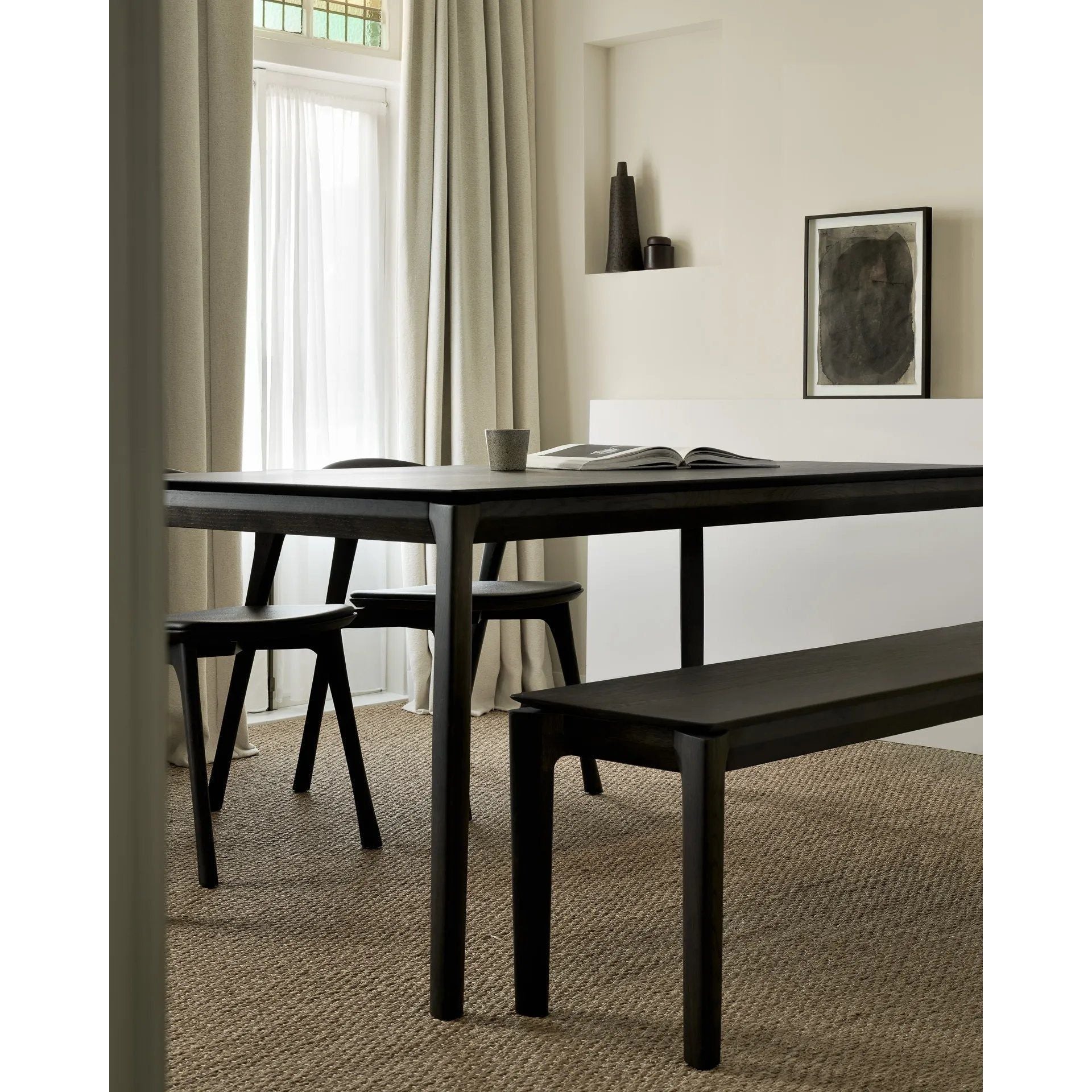 Featuring Bok Oak Brown Bench by Ethnicraft at Amethyst Home. Reminiscent of a goat's curved horns, the Bok collection combines sculptural elegance and contemporary crafting into a graceful and airy form. The Bok bench pairs well with the Bok dining table, but also as a stand-alone against a wall, in a hallway or at the end of a bed.Collection : BokFinish : Var. Amethyst Home provides interior design, new home construction design consulting, vintage area rugs, and lighting in the Miami metro area.