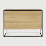Featuring Monolit Sideboard by Ethnicraft at Amethyst Home. Practicality without sacrificing style. The contrasting characteristics of wood and the rectangular metal frame of the Monolit sideboard create a unique backdrop for all modern media equipment.
Dimensions: 20.5" L x 46" W x 33" H 
Adjustable Shelves : YesAnti-tipping mechanism : YesBrushed : This . Amethyst Home provides interior design, new home construction design consulting, vintage area rugs, and lighting in the Des Moines metro area.