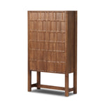 Featuring Ezri Cocoa Oak Cabinet by Four Hands at Amethyst Home. Made from solid oak and finished in a rich cocoa, tall cabinetry is carved with a unique grid-like pattern, for an organic look and textural touch. Interior shelving made from solid mango brings bonus storage to any room. Subtle variations in natural wood graining to be expected.Overall Dimensions: 45.00"w x 18.00"d x . Amethyst Home provides interior design, new construction, custom furniture, and area rugs in the Seattle metro area