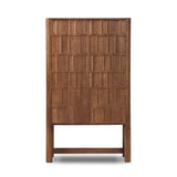 Featuring Ezri Cocoa Oak Cabinet by Four Hands at Amethyst Home. Made from solid oak and finished in a rich cocoa, tall cabinetry is carved with a unique grid-like pattern, for an organic look and textural touch. Interior shelving made from solid mango brings bonus storage to any room. Subtle variations in natural wood graining to be expected.Overall Dimensions: 45.00"w x 18.00"d. Amethyst Home provides interior design, new construction, custom furniture, and area rugs in the Washington metro area