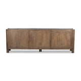 Featuring Ezri Cocoa Oak Sideboard by Four Hands at Amethyst Home. Grain and character variation within a solid oak finish give this sideboard organic visual interest. The carved design and floor-to-top cylinder legs give a primitive look that balances the movement of the wood pattern.Overall Dimensions: 98.00"w x 18.00"d x 34.00"hWeight : 245.38 lbsMaterials : Solid Oak. Amethyst Home provides interior design, new construction, custom furniture, and area rugs in the Houston metro area