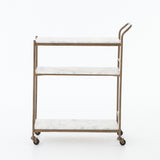 Featuring Tatum Antique Brass Rectangular Bar Cart by Four Hands at Amethyst Home. Entertain with style.  Beautiful natural marble shelves with a brass frame instantly infuses your space with style.Overall Dimensions: 30.00"w x 16.00"d x 36.25"hWeight : 85.98 lbsMaterials : Iron, Solid Marble. Amethyst Home provides interior design, new construction, custom furniture, and area rugs in the Omaha metro area
