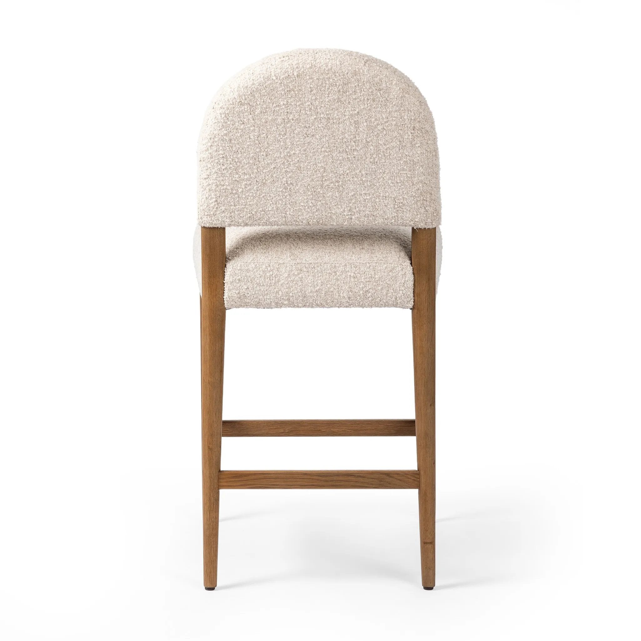 Featuring Abilene Somerton Ash Bar + Counter Stool by Four Hands at Amethyst Home. A heritage design gets a modern twist. Simple tapered legs of warm oak mark this dining room chair's traditional form, while an arched seat back with off-white upholstery updates this comfortable seating style, perfectly sized for the counter. Performance fabrics are speciall. Amethyst Home provides interior design, new home construction design consulting, vintage area rugs, and lighting in the Calabasas metro area.