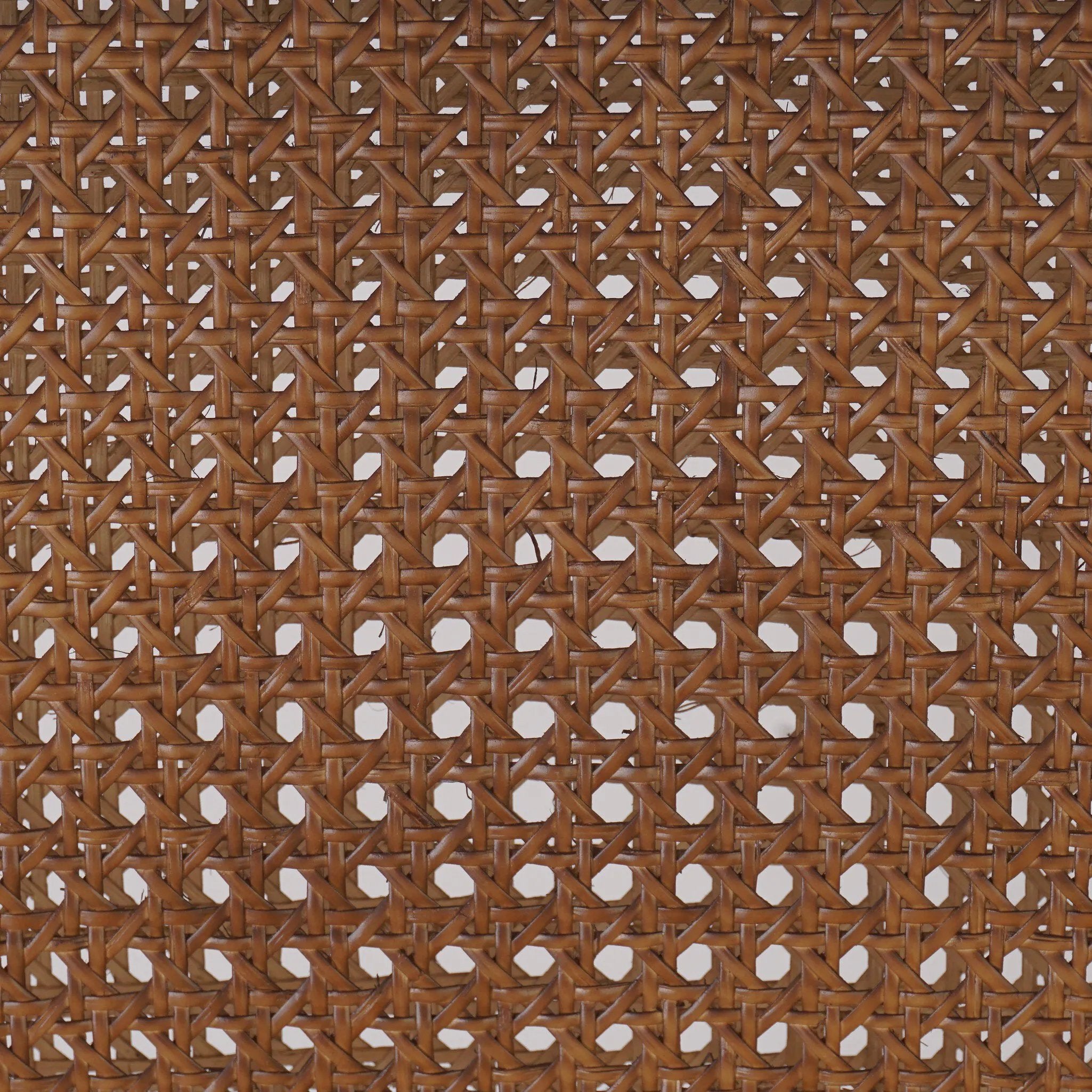 Mixed materials refresh a retro style. Cane frames performance fabric seating with slight distressing, bringing more character to the seat. Performance fabrics are specially created to withstand spills, stains, high traffic and wear, ensuring long-term comfort and unmatched durability. Amethyst Home provides interior design, new home construction design consulting, vintage area rugs, and lighting in the Boston metro area.