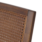 Mixed materials refresh a retro style. Cane frames performance fabric seating with slight distressing, bringing more character to the seat. Performance fabrics are specially created to withstand spills, stains, high traffic and wear, ensuring long-term comfort and unmatched durability. Amethyst Home provides interior design, new home construction design consulting, vintage area rugs, and lighting in the Monterey metro area.