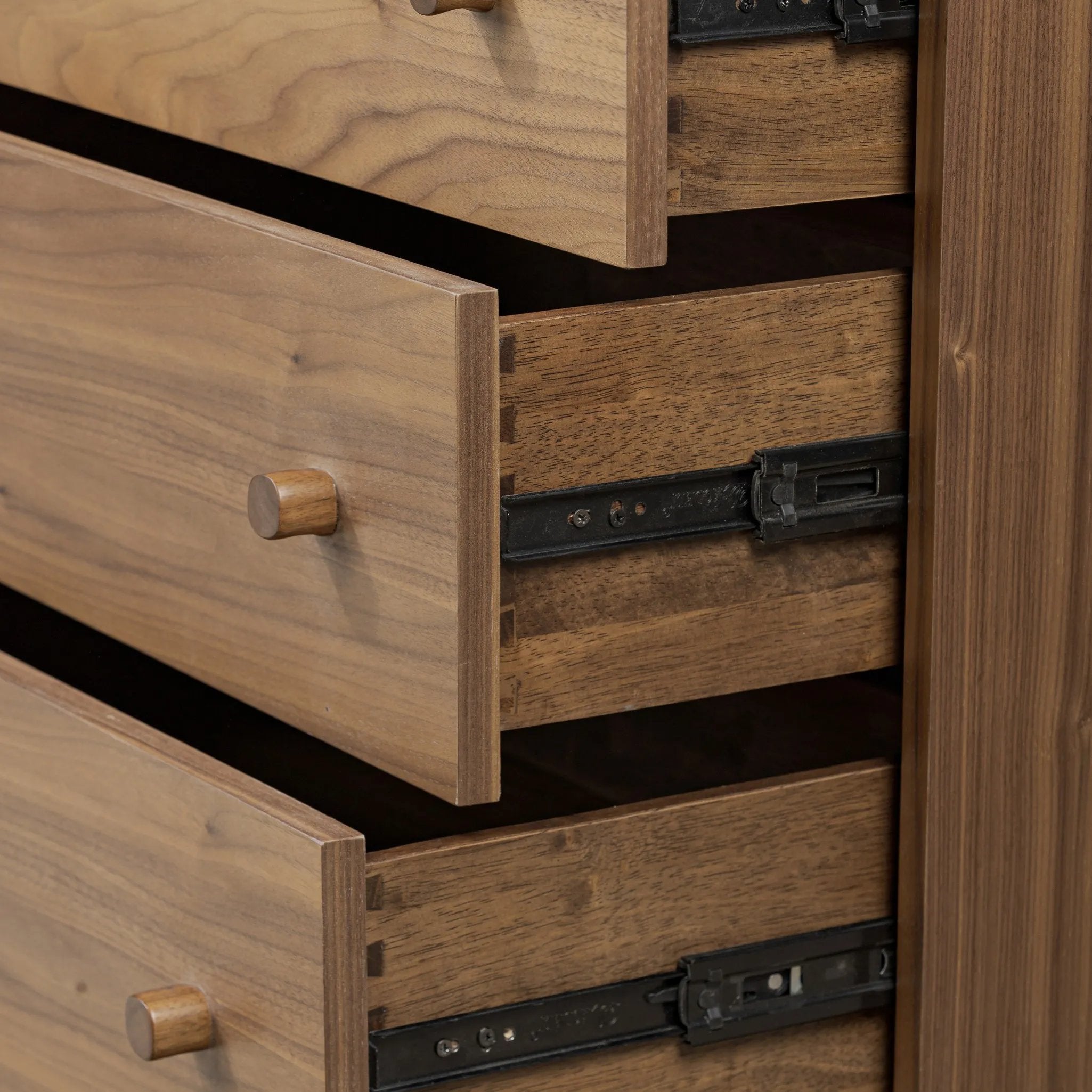 Featuring Arturo Natural Walnut Veneer 9 Drawer Dresser by Four Hands at Amethyst Home. Inspired by campaign-style furniture of the 1800s — packable pieces first designed for traveling military use — a simply shaped dresser of natural walnut features a subtly inset top and rounded legs, finished with wooden hardware. This item has been modified to comply wi. Amethyst Home provides interior design, new home construction design consulting, vintage area rugs, and lighting in the Charlotte metro area.