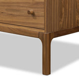 Featuring Arturo Natural Walnut Veneer 9 Drawer Dresser by Four Hands at Amethyst Home. Inspired by campaign-style furniture of the 1800s — packable pieces first designed for traveling military use — a simply shaped dresser of natural walnut features a subtly inset top and rounded legs, finished with wooden hardware. This item has been modified to comply with . Amethyst Home provides interior design, new home construction design consulting, vintage area rugs, and lighting in the Dallas metro area.