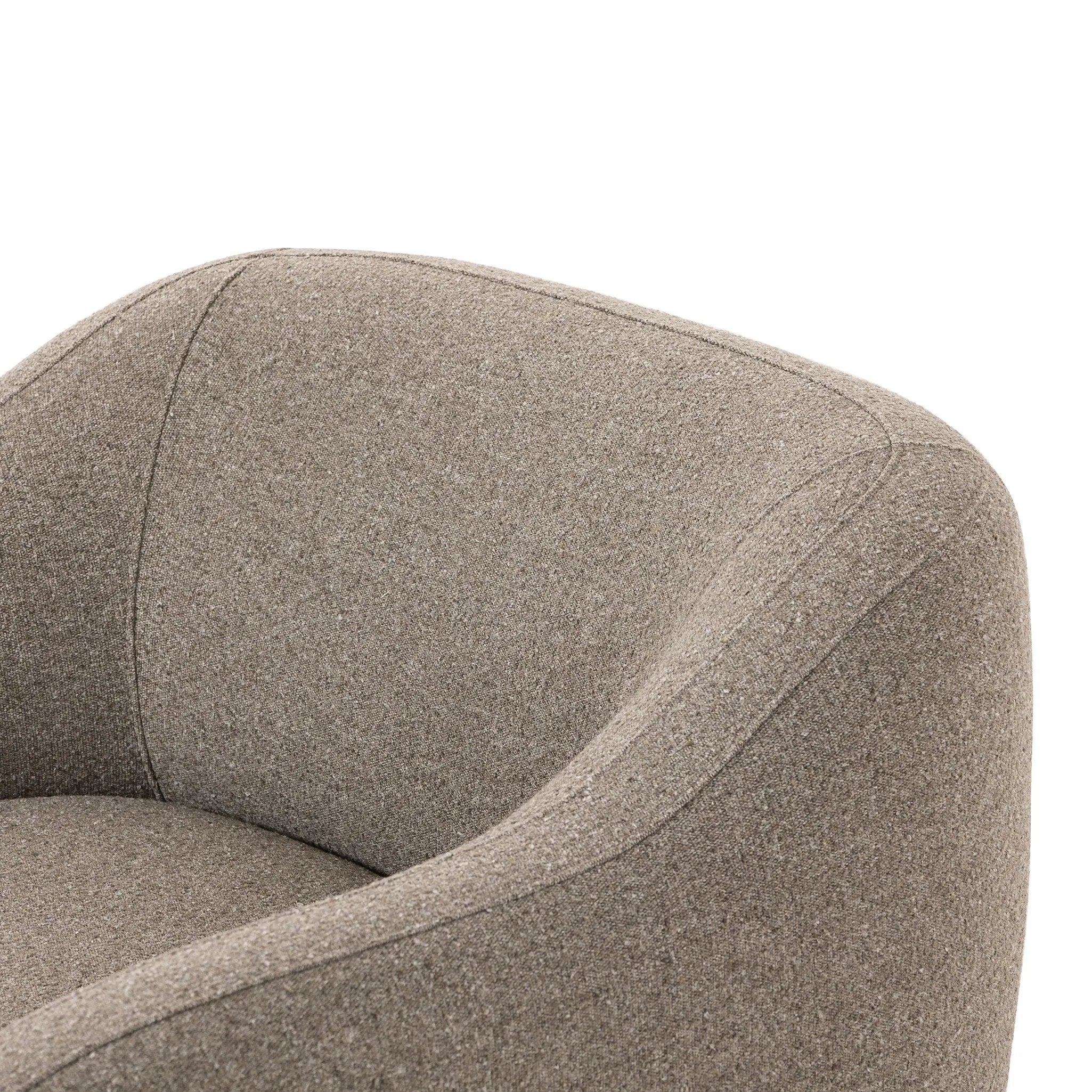 Featuring Audrey Weslie Feather Chair by Four Hands at Amethyst Home. This elevated arm chair features a clean top piece that partially overlaps its bottom counterpart and seamlessly blends the back cushion into the armrests in one fluid form. The seat's legs appear to extend from the seat and back, adding architectural interest. Upholstered in a recycled . Amethyst Home provides interior design, new home construction design consulting, vintage area rugs, and lighting in the Des Moines metro area.