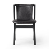 Featuring Baden Sonoma Black Dining Chair by Four Hands at Amethyst Home. Midcentury-inspired with its minimalist wooden frame, this armless dining chair features a low back and float-like seat upholstered in slightly distressed black top-grain leather exclusive to Four Hands. Leather wrap detailing for texture.Overall Dimensions: 19.75"w x 23.25"d x 32.25". Amethyst Home provides interior design, new home construction design consulting, vintage area rugs, and lighting in the Charlotte metro area.