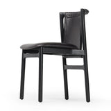 Featuring Baden Sonoma Black Dining Chair by Four Hands at Amethyst Home. Midcentury-inspired with its minimalist wooden frame, this armless dining chair features a low back and float-like seat upholstered in slightly distressed black top-grain leather exclusive to Four Hands. Leather wrap detailing for texture.Overall Dimensions: 19.75"w x 23.25"d x 32.25"hWei. Amethyst Home provides interior design, new home construction design consulting, vintage area rugs, and lighting in the Miami metro area.