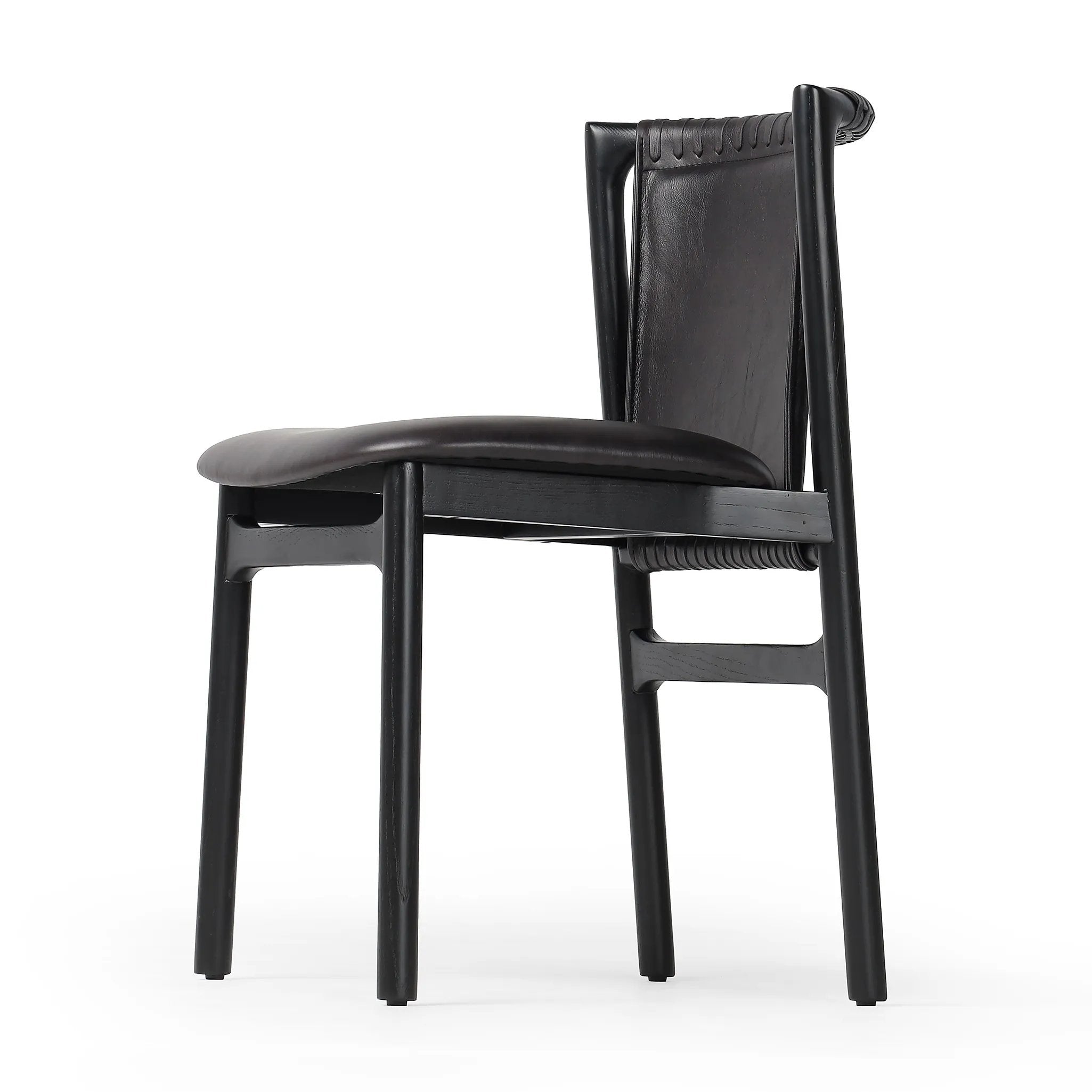 Featuring Baden Sonoma Black Dining Chair by Four Hands at Amethyst Home. Midcentury-inspired with its minimalist wooden frame, this armless dining chair features a low back and float-like seat upholstered in slightly distressed black top-grain leather exclusive to Four Hands. Leather wrap detailing for texture.Overall Dimensions: 19.75"w x 23.25"d x 32.25"hWei. Amethyst Home provides interior design, new home construction design consulting, vintage area rugs, and lighting in the Miami metro area.
