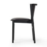 Featuring Baden Sonoma Black Dining Chair by Four Hands at Amethyst Home. Midcentury-inspired with its minimalist wooden frame, this armless dining chair features a low back and float-like seat upholstered in slightly distressed black top-grain leather exclusive to Four Hands. Leather wrap detailing for texture.Overall Dimensions: 19.75"w x 23.25"d x 32.25. Amethyst Home provides interior design, new home construction design consulting, vintage area rugs, and lighting in the Washington metro area.