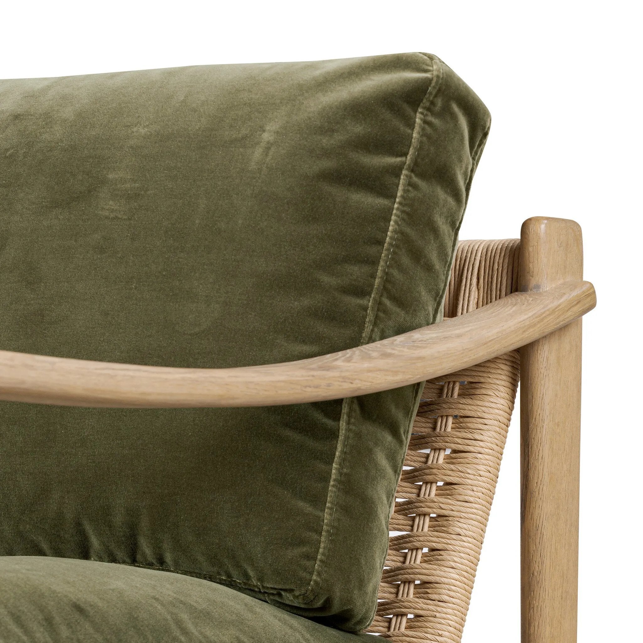 Tapered legs and sloped paddle arms frame the visible joinery and handwoven rope details of this accent chair, for a monochromatic yet visually intriguing frame. Finished with loose, velvet-upholstered seat and back cushions in a rich olive hue — for a subtle color contrast that celebrates the natural beauty of each material Amethyst Home provides interior design, new home construction design consulting, vintage area rugs, and lighting in the Winter Garden metro area.