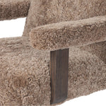 A large, comfort-driven desk chair of taupe shearling tops a 360-degree swivel, for a luxurious take on office styling Amethyst Home provides interior design, new home construction design consulting, vintage area rugs, and lighting in the Omaha metro area.