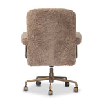 A large, comfort-driven desk chair of taupe shearling tops a 360-degree swivel, for a luxurious take on office styling Amethyst Home provides interior design, new home construction design consulting, vintage area rugs, and lighting in the Park City metro area.