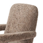 A large, comfort-driven desk chair of taupe shearling tops a 360-degree swivel, for a luxurious take on office styling Amethyst Home provides interior design, new home construction design consulting, vintage area rugs, and lighting in the Salt Lake City metro area.