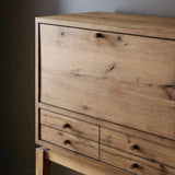 Featuring Bergstrom Warm Natural Oak Veneer Secretary Desk by Four Hands at Amethyst Home. A fresh take on the traditional secretary desk, made from warm natural oak. A flip-down top creates a wide writing surface, offering the perfect place to pen a handwritten note. Overall Dimensions: 35.00"w x 18.00"d x 48.00"h. Amethyst Home provides interior design, new home construction design consulting, vintage area rugs, and lighting in the Charlotte metro area.