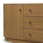 Fluid contours give shape to this solid mindi media console, topped with a creamy marbled top. Two doors with knobbed pulls and three drawers open to spacious storage Amethyst Home provides interior design, new home construction design consulting, vintage area rugs, and lighting in the Des Moines metro area.