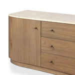 Fluid contours give shape to this solid mindi media console, topped with a creamy marbled top. Two doors with knobbed pulls and three drawers open to spacious storage Amethyst Home provides interior design, new home construction design consulting, vintage area rugs, and lighting in the San Diego metro area.