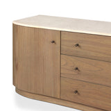 Fluid contours give shape to this solid mindi media console, topped with a creamy marbled top. Two doors with knobbed pulls and three drawers open to spacious storage Amethyst Home provides interior design, new home construction design consulting, vintage area rugs, and lighting in the San Diego metro area.