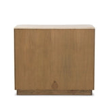 Fluid contours give shape to this solid mindi cabinet, topped with a creamy marbled top. Two doors with knobbed pulls open to inset shelves for organized storage Amethyst Home provides interior design, new home construction design consulting, vintage area rugs, and lighting in the Salt Lake City metro area.