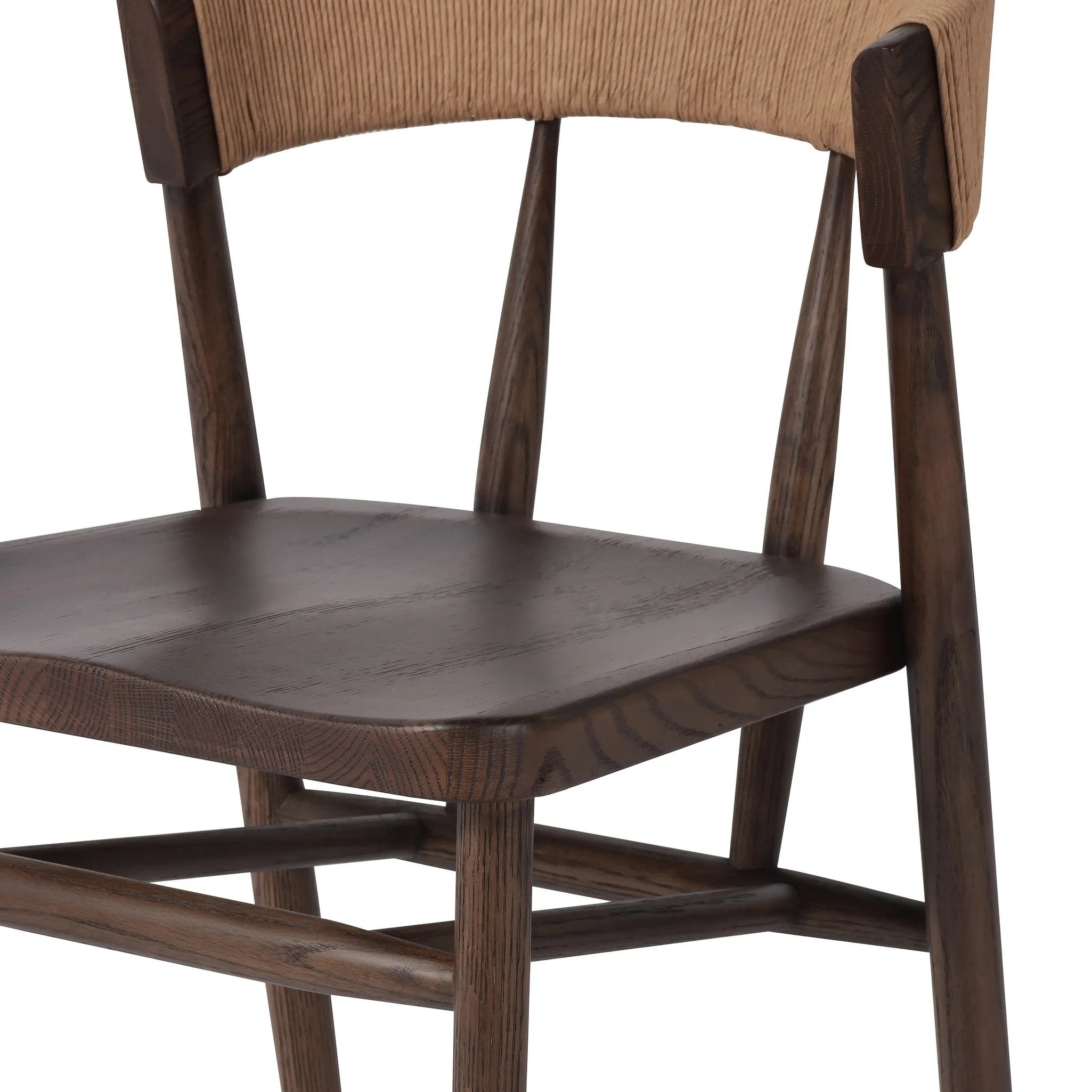 Featuring Buxton Natural Paper Rush Dining Chair by Four Hands at Amethyst Home. A solid oak dining chair defined by tapered legs and framing gives an updated look to the classic whistler chair. Finished with a paper rush wrapped detail on the back.Overall Dimensions: 19.50"w x 22.25"d x 31.50"hWeight : 20.79 lbsMaterials : Rush, Solid Oak. Amethyst Home provides interior design, new home construction design consulting, vintage area rugs, and lighting in the Seattle metro area.