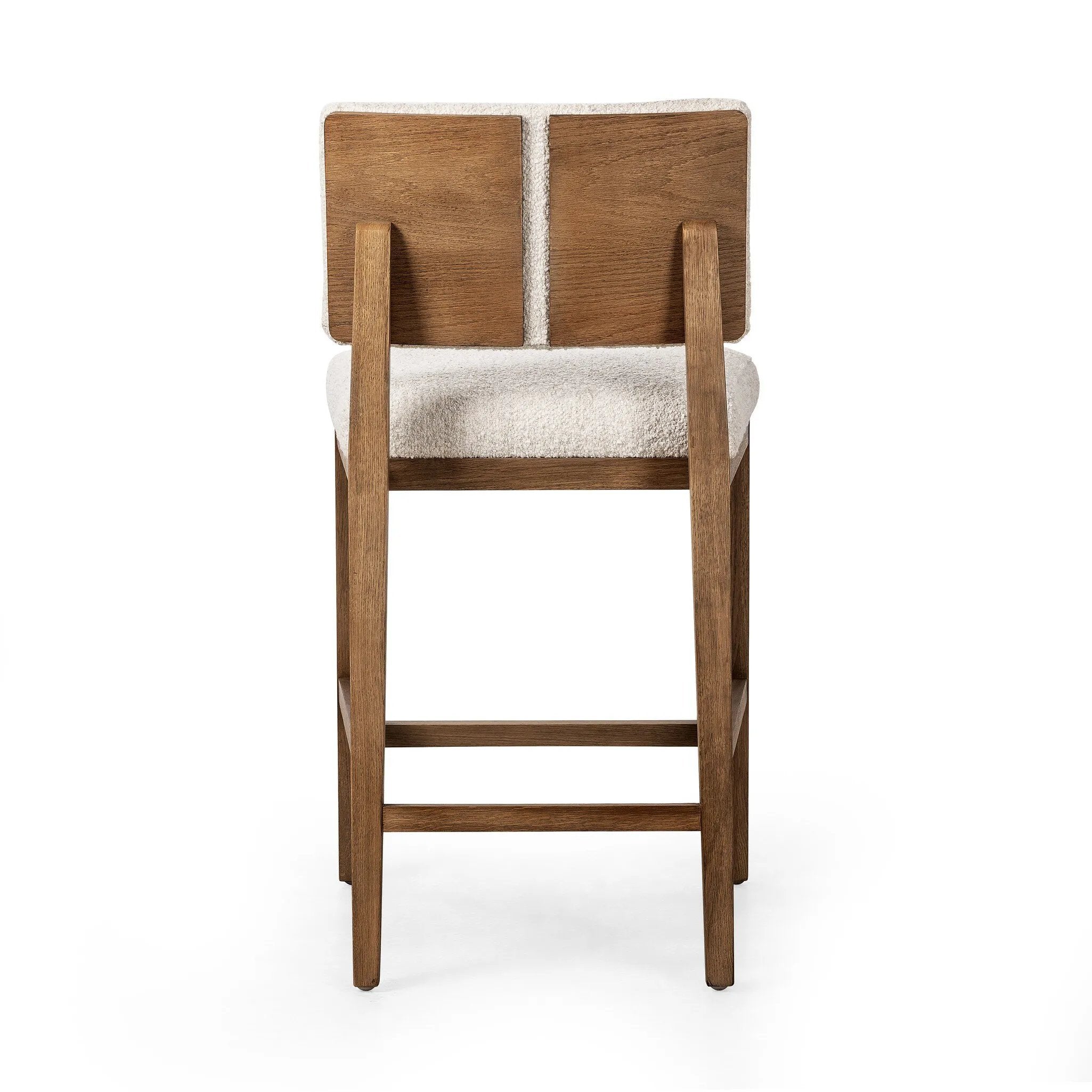 Featuring Charles Somerton Ash Counter Stool by Four Hands at Amethyst Home. This stool is all about the textile -- gorgeous French inspired boucle with a cool toned oak base.  Gorgeous back detail makes this Charles stool attractive from all angles.
Overall Dimensions: 25.5" L x 20.75 " W x 39.5" HClearance from Floor 16.75"Distance between Legs (Front to. Amethyst Home provides interior design, new home construction design consulting, vintage area rugs, and lighting in the Des Moines metro area.