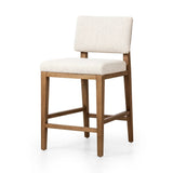 Featuring Charles Somerton Ash Counter Stool by Four Hands at Amethyst Home. This stool is all about the textile -- gorgeous French inspired boucle with a cool toned oak base.  Gorgeous back detail makes this Charles stool attractive from all angles.
Overall Dimensions: 25.5" L x 20.75 " W x 39.5" HClearance from Floor 16.75"Distance between Legs (Front to Back. Amethyst Home provides interior design, new home construction design consulting, vintage area rugs, and lighting in the Omaha metro area.