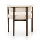 Featuring Cassie Charter Oatmeal Dining Chair by Four Hands at Amethyst Home. Upholstered in high-performance fabric, this sculpted dining style features a comfortable yoke back and exterior fold detailing, all framed by solid ash. Performance fabrics are specially created to withstand spills, stains, high traffic and wear, ensuring long-term comfort and u. Amethyst Home provides interior design, new home construction design consulting, vintage area rugs, and lighting in the Washington metro area.