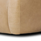 Meet modern comfort. Clean curves, impeccable tailoring and taupe top-grain leather with a pronounced grain bring an elevated