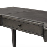 Featuring Claude Distressed Black Oak Veneer Desk by Four Hands at Amethyst Home. This refreshed directoire-style desk pairs a 100% top-grain leather inset top with a unique reverse breakfront and recessed center drawer. Finished in distressed black oak, it offers the workspace a classic yet updated feel.
Overall Dimensions: 28.0" L x 68.0 " W x 30.0" H
Mat. Amethyst Home provides interior design, new home construction design consulting, vintage area rugs, and lighting in the Charlotte metro area.