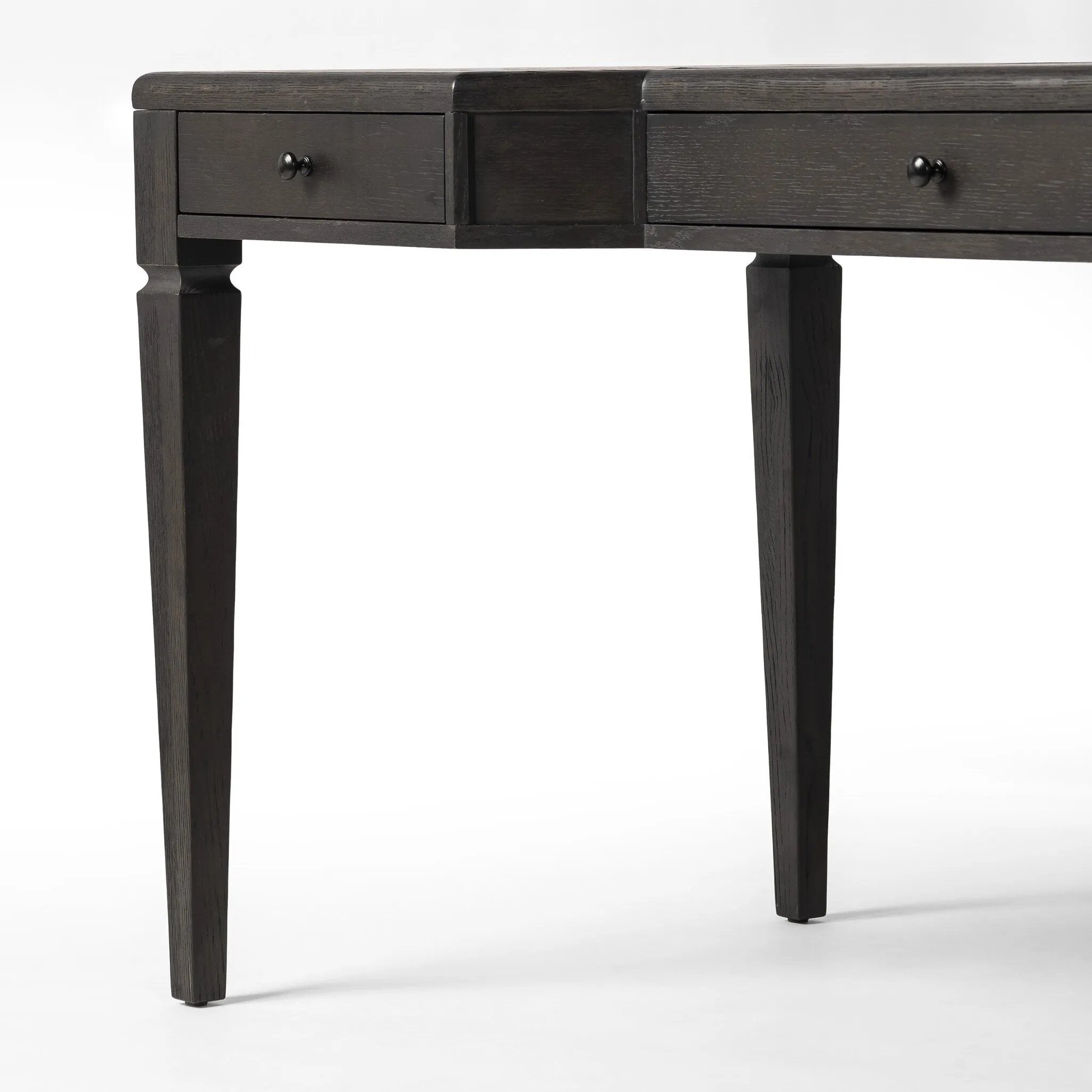 Featuring Claude Distressed Black Oak Veneer Desk by Four Hands at Amethyst Home. This refreshed directoire-style desk pairs a 100% top-grain leather inset top with a unique reverse breakfront and recessed center drawer. Finished in distressed black oak, it offers the workspace a classic yet updated feel.
Overall Dimensions: 28.0" L x 68.0 " W x 30.0" H
Mater. Amethyst Home provides interior design, new home construction design consulting, vintage area rugs, and lighting in the Houston metro area.