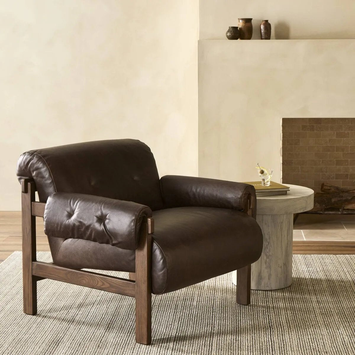 Featuring Cora Conroe Cigar Chair by Four Hands at Amethyst Home. This cozy fireside chair is the embodiment of comfort with its S-spring seating construction, plush seat and back, and feather fiber-filled arm cushions. Blind tufts on the arms and back lend a subtle detail that elevates the overall style.
Overall Dimensions: 34.50"w x 35.50"d x 30.50"hWeight . Amethyst Home provides interior design, new home construction design consulting, vintage area rugs, and lighting in the Seattle metro area.