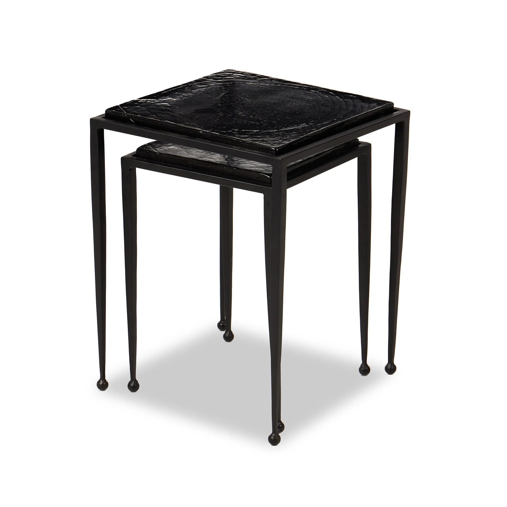 Featuring Dexter Smoked Black Cast Glass Nesting Tables by Four Hands at Amethyst Home. Embrace the mysterious with the Dexter smoked glass nesting tables.  Beautiful smoked glass gives a warm modern vibe while being practical.Overall Dimensions: 16.25"w x 16.25"d x 21.00"hWeight : 52.91 lbsMaterials : Cast Glass, Iron. Amethyst Home provides interior design, new home construction design consulting, vintage area rugs, and lighting in the Seattle metro area.