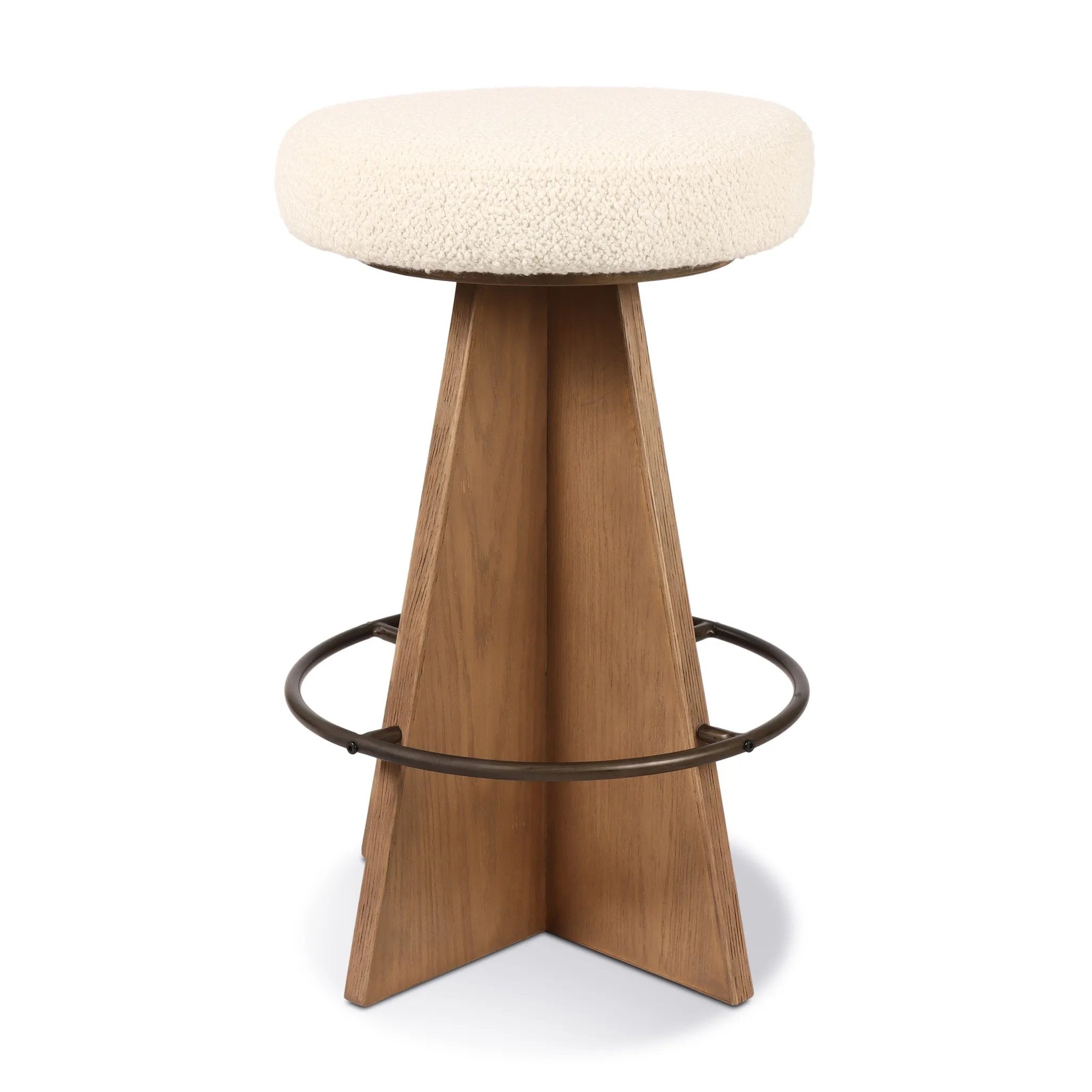Featuring Damon Durham Cream Swivel Bar + Counter Stool by Four Hands at Amethyst Home. A gorgeous silhouette -- the Damon stool is an Amethyst fave.
Large angular panels merge to form a geometrically inspired base in this modern counter stool. The circle metal ring around the base serves as a footrest, while the round upholstered cushion provides comfo. Amethyst Home provides interior design, new home construction design consulting, vintage area rugs, and lighting in the Winter Garden metro area.