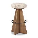 Large angular panels merge to form a geometrically inspired base in this modern counter stool. The circle metal ring around the base serves as a footrest, while the round upholstered cushion provides comfortable seating. The 360-degree swivel function adds versatility, and the combination of wood, metal, and fabric evoke a mixed material moment Amethyst Home provides interior design, new home construction design consulting, vintage area rugs, and lighting in the Scottsdale metro area.