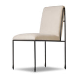 European inspiration gives streamlined character to this high-back metal-framed dining chair. Bent metal detail and tapered f