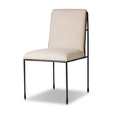 European inspiration gives streamlined character to this high-back metal-framed dining chair. Bent metal detail and tapered f